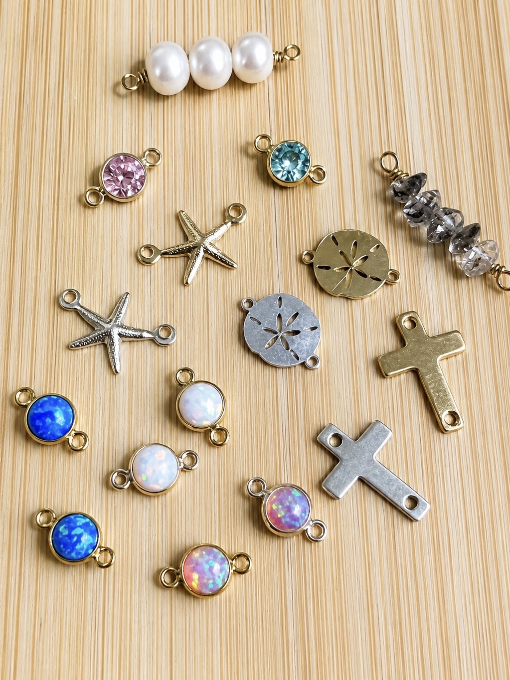 Pearl, gemstone, cross, starfish, sand dollar, and opal jewelry connectors